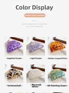 Close-up of acetic acid hair claws in purple, leopard, beige, and mermaid white colors