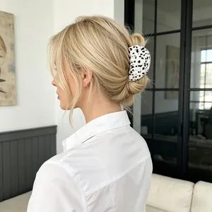 Chic semi-circular acetate hair claw clip with black and white floral pattern for women