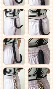 Detail showing plush animal tail with belt and safety pin for cosplay costumes