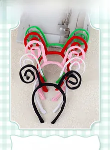 Detail of colorful plush ant antenna headbands showing flexible wire and soft fabric texture