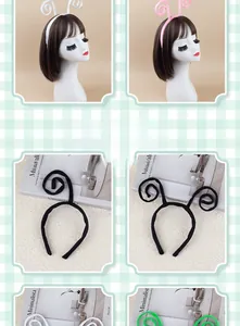 Detail of colorful plush snail antenna headbands in white, pink, black, and green