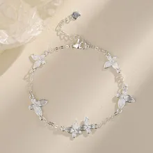Detailed view of S925 sterling silver butterfly bracelet with cubic zirconia and lobster clasp