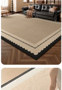 Detailed view of the woven ice silk rug texture with black geometric border accents