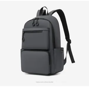 Detailed view of the dark grey matte waterproof laptop backpack with multi-layer zippers