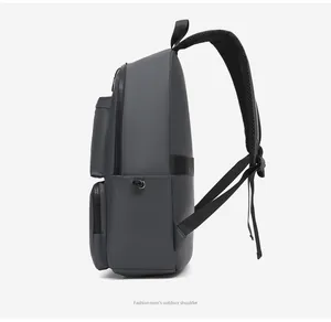 Close-up of the breathable mesh shoulder straps and ergonomic layered side profile of this gray bag
