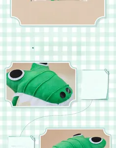 Detail of green plush crocodile headband showing stitched eyes and 59g lightweight design