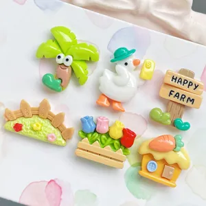 Macro view of 6-piece resin farm animal set including ducks and a yellow cottage