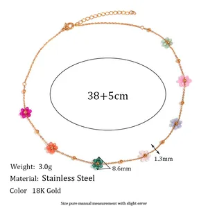 Detailed view of 18K gold plated stainless steel necklace with colorful flower beads