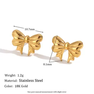 Detailed size view of gold bow stud earrings in 18K plated stainless steel material