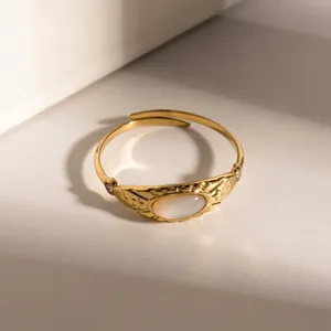 French vintage gold open ring with star patterns and oval white zircon stone
