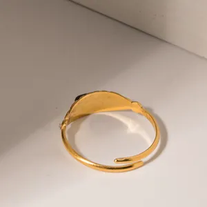 Vintage gold adjustable stainless steel ring with black inlay and small crystals