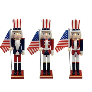 Detailed trio of wooden Uncle Sam nutcrackers holding American flags on white background