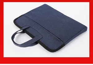 Detail of dark blue business briefcase showing dual-layer fabric and textured finish
