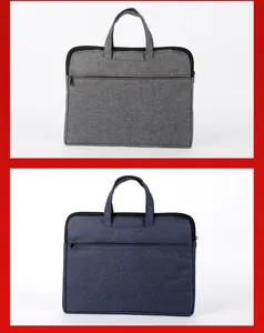 Front view of minimalist business briefcases in grey and navy with large zipper pockets