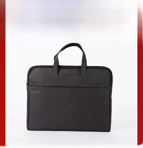 Detailed view of gray oxford fabric business briefcase with sturdy handles and front pocket