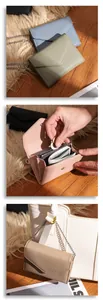 Litchi texture leather wallet with chain detail showing interior card slots and zipper pocket