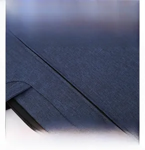 Detailed macro view of dark blue cationic foam fabric with durable black zipper