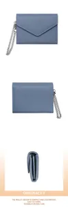 Detailed view of smog blue litchi grain leather wallet with silver chain and slim tri-fold design