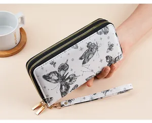 Detail of double-layer zipper long wallet with black butterfly print and wrist strap