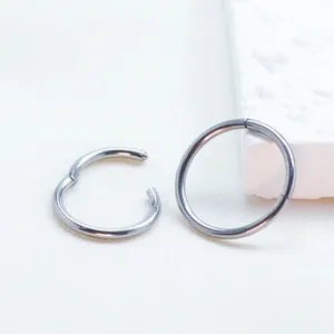 F136 titanium seamless hinged clicker rings for body piercing in polished silver finish