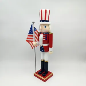 Detailed shot of patriotic Uncle Sam nutcracker with US flag on wooden base
