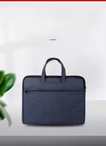Detail of blue business briefcase featuring durable fabric texture and a front zipper pocket