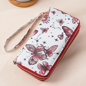 Women's long quilted double zipper wallet featuring butterfly prints and wrist strap
