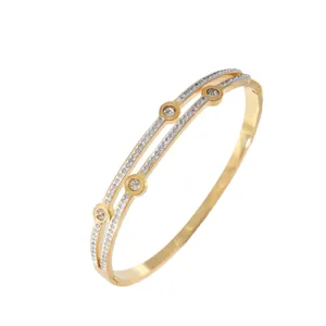 Golden titanium steel hinged bangle with double row sparkling zircons and round stones
