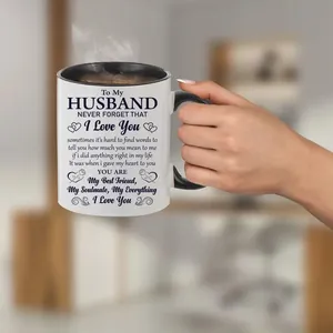 Close-up of 11oz ceramic coffee mug with heartfelt message and steam for husband gift