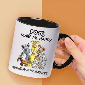 Detail of 11oz ceramic mug featuring black handle and humorous dog slogan print