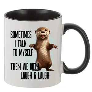 Detailed view of the otter illustration and humor quote on a white ceramic coffee mug