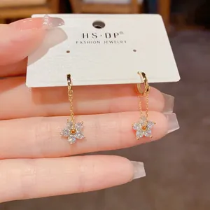 Elegant gold chain earrings with zircon flower pendant, delicate floral jewelry for women