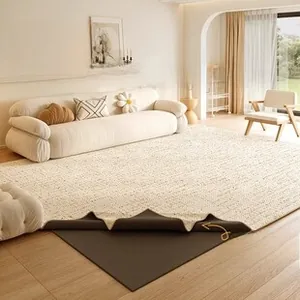 Detail of washable chenille rug showing the removable cream top layer and base mat