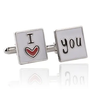 Macro detail of square cufflinks featuring I love you lettering with a red heart symbol