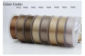 Close-up of earth-tone satin ribbons in eight shades on clear spools with silk texture