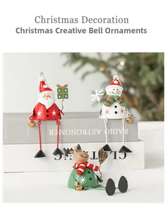 Detailed view of creative Christmas bell pendants with Santa, snowman and reindeer designs
