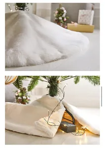 Close-up of soft white faux fur Christmas tree skirt with festive warm LED lighting