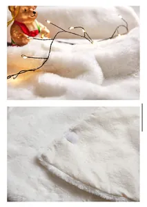 Detail showing plush white faux fur Christmas tree skirt with secure Velcro closure