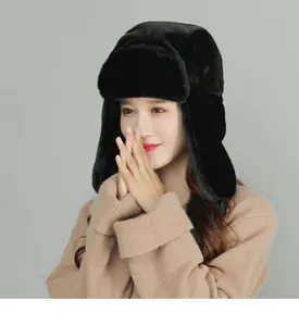 Detailed view of plush earflap aviator hat in black faux fur for winter warmth