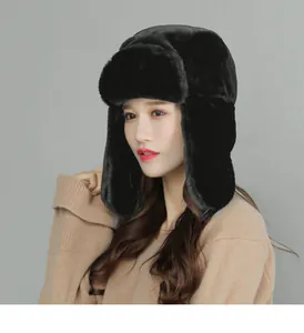 Detail of premium black faux fur trapper hat with thick thermal ear flaps for winter comfort