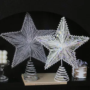 Detailed close-up of woven Christmas tree topper stars with glitter and spring base