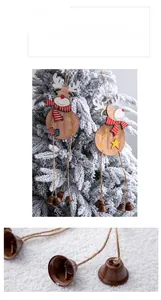 Detailed view of wooden reindeer Christmas tree ornaments with rustic metal bells