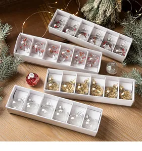 Set of transparent Christmas baubles with stars and snowflakes in 6-piece boxes