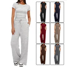 Detail of high waist drawstring trousers and fabric texture of 2-piece lounge set