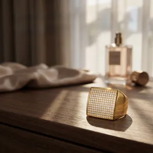 Macro detail of 18K gold plated square signet ring with micro-pave diamonds on wood