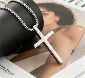 Polished silver stainless steel cross pendant on a sturdy box chain necklace for men