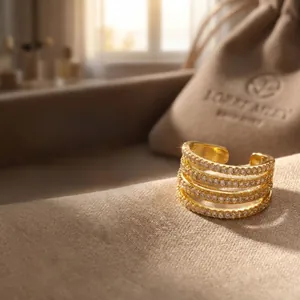 Macro shot of 18K gold plated multi-layer ring with sparkling micro-pave zircons
