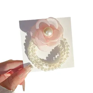 Elegant pink camellia flower hair tie with double layer faux pearl beads decoration