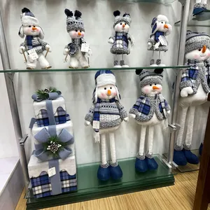 Blue and white plaid plush snowman ornaments and gift boxes for Christmas decor