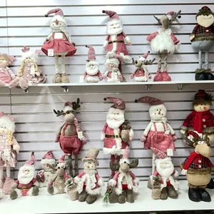 Detailed collection of festive Christmas plush dolls with knitted hats and scarves